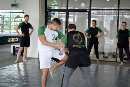 Self-defence drill on the mats at Core Combat gym in Chiang Mai